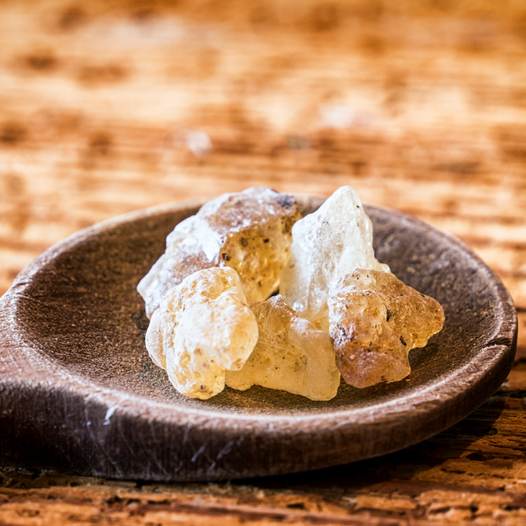pieces of copal on a spoon