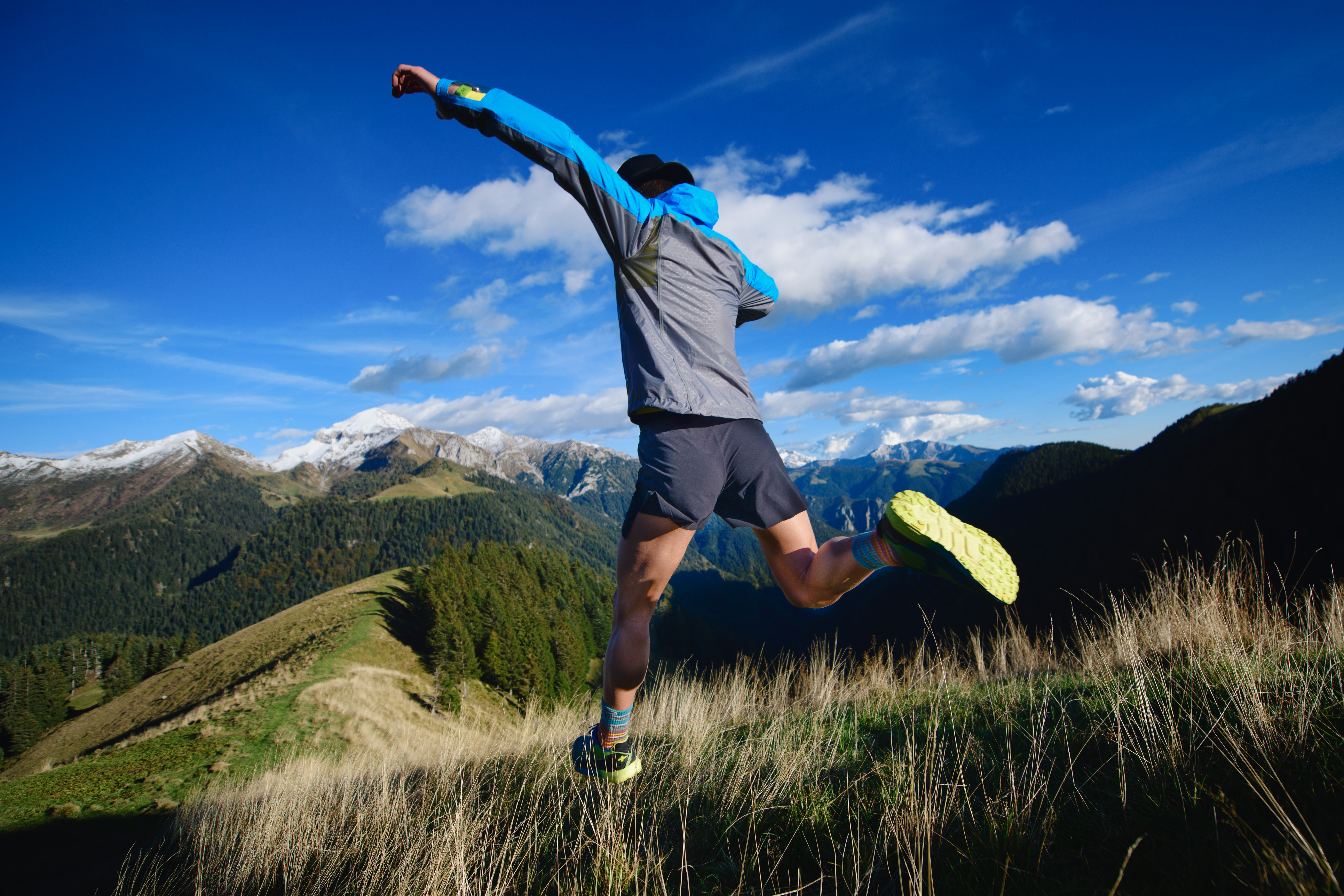 Person jumping and running outdoors